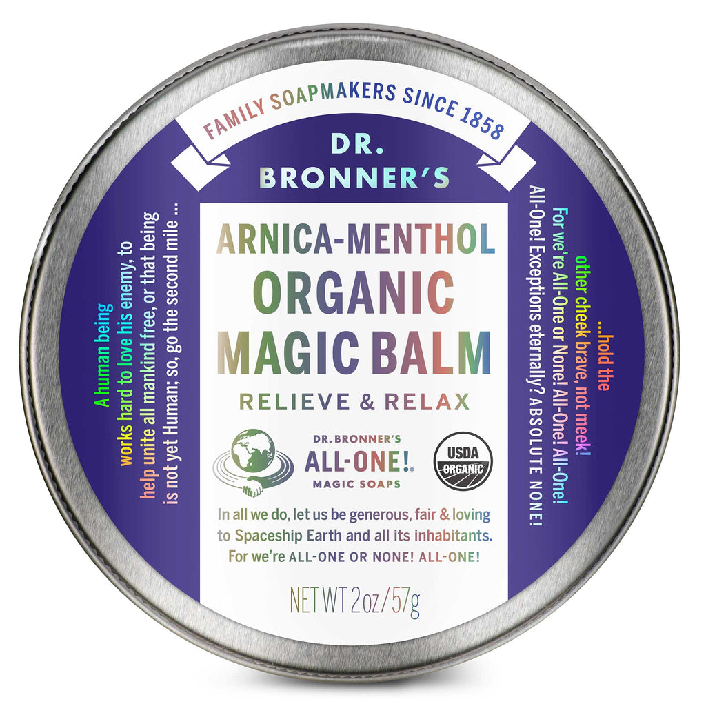 A round tin labeled Dr. Bronners Arnica Menthol Organic Magic Balm sits centered, emphasizing relief and relaxation. Surrounding text highlights benefits and ethical principles. The tin weighs 2 oz57 g, promoting eco friendly, organic skincare [2 oz]