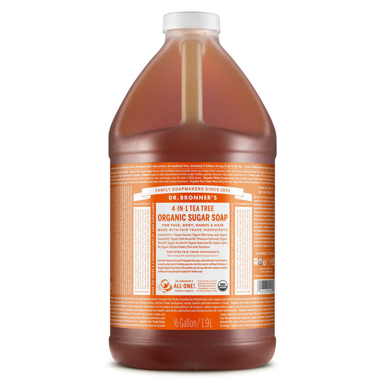 A large bottle of Dr. Bronners 4 in 1 Tea Tree Organic Sugar Soap, marked Gallon 1.9L, featuring detailed product information on the label, ideal for eco friendly and natural cleaning [1/2 Gallon]