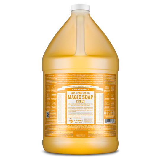 A large, transparent bottle labeled Dr. Bronners 18 in 1 Pure Castile Magic Soap in citrus fragrance. The container, holding 1 gallon , features detailed usage instructions and sustainability information [1 Gallon]