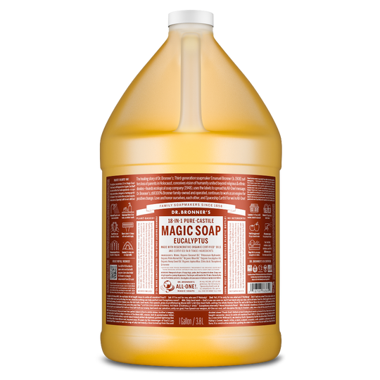 A large, one gallon bottle labeled Dr. Bronners 18 in 1 Pure Castile Magic Soap Eucalyptus sits upright. The label features detailed usage instructions and ingredient information in a red and white color scheme [1 Gallon]