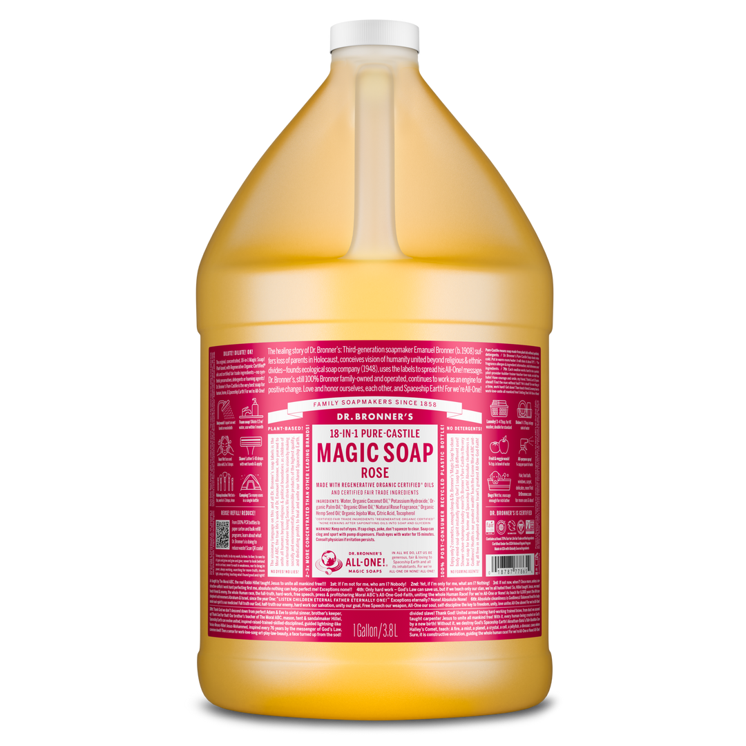 A one gallon bottle of Dr. Bronners 18 in 1 Pure Castile Magic Soap in rose scent features a prominent red label with detailed text about ingredients and uses. The eco friendly soap highlights its fair trade and organic certifications [1 Gallon]