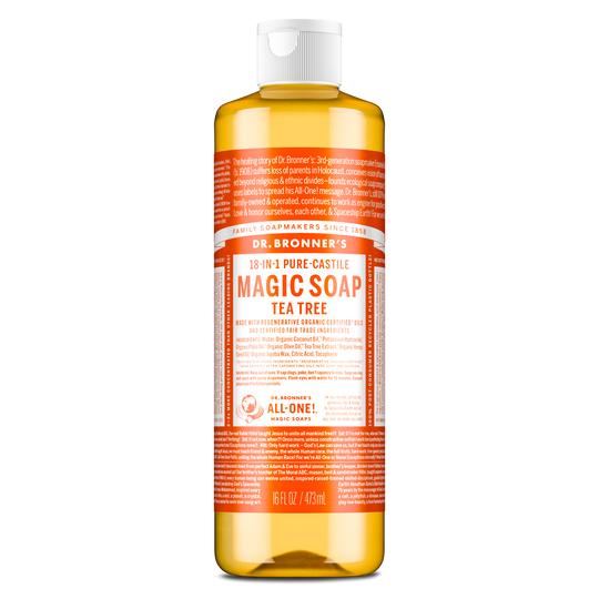A bottle of Dr. Bronners 18 in 1 Pure Castile Magic Soap, Tea Tree variant, filled with amber liquid sits upright. The label emphasizes its organic certification and multi purpose use in personal care and cleaning [16 oz]