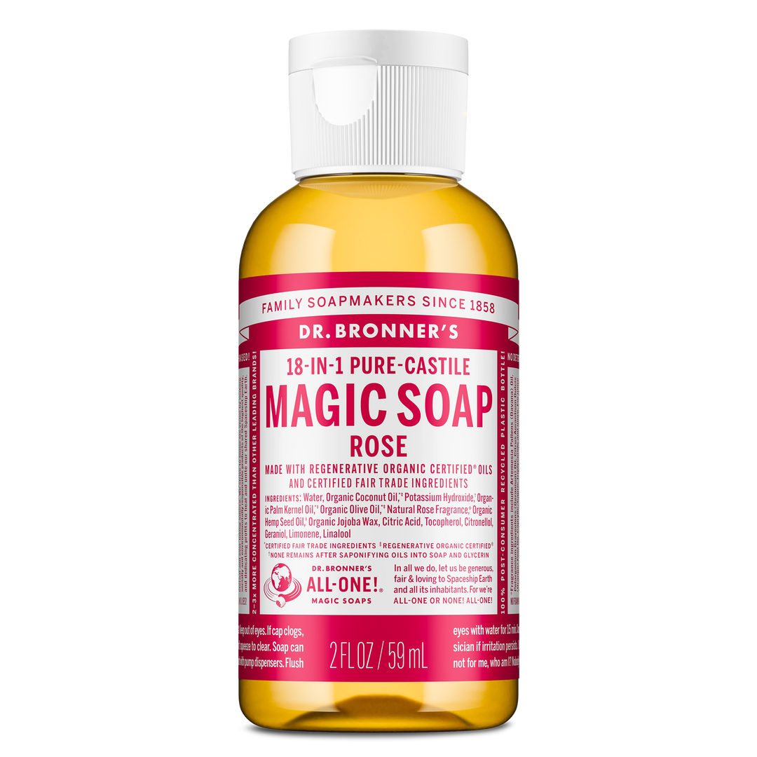 Bottle of Dr. Bronners 18 in 1 Pure Castile Magic Soap in rose scent, labeled with organic, fair trade ingredients, stands on a white background. Size 2 FL OZ 59 mL [2 oz]