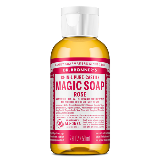 Bottle of Dr. Bronners 18 in 1 Pure Castile Magic Soap in rose scent, labeled with organic, fair trade ingredients, stands on a white background. Size 2 FL OZ 59 mL [2 oz]