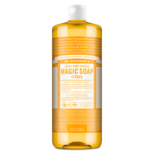 A large bottle of Dr. Bronners 18 in 1 Pure Castile Magic Soap, Citrus variant, stands upright. The label highlights family soapmakers, organic certification, and versatility for multiple cleaning uses. Capacity is 32 fl oz [32 oz]