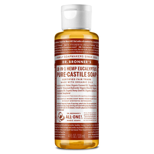 A brown labeled bottle of Dr. Bronners liquid castile soap stands upright, featuring white text detailing its organic and fair trade ingredients. The setting suggests personal care or cleaning purposes [4 oz]