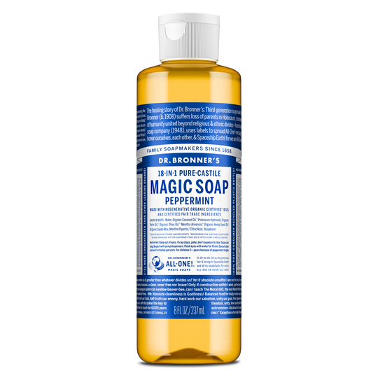 A bottle of Dr. Bronners Pure Castile Peppermint Soap stands upright. The blue label includes comprehensive text detailing ingredients and uses, emphasizing its organic, vegan, eco friendly, and biodegradable qualities [8 oz]